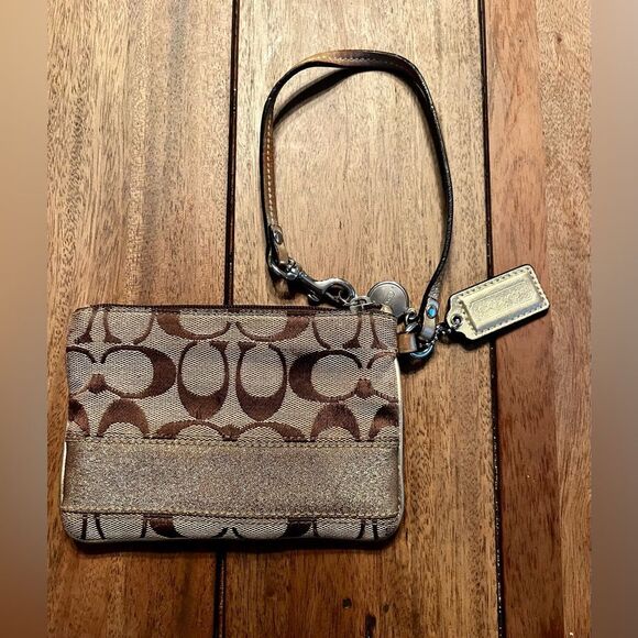 Coach Brown and Tan Signature Wristlet with gold stripe. Vintage
4x6 inches - Picture 3 of 9